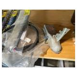 Assorted Automotive Parts Including Wiper Blades, Coupler, and Hubcaps