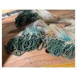 Collection of Green and White Fishing Nets