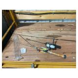 Collection of Fishing Rods and Reels with Fishing Accessories