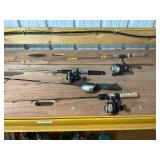 Collection of Fishing Rods and Reels with Fishing Accessories