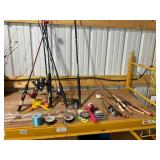 Assorted Fishing Gear with Rods, Reels, and Accessories