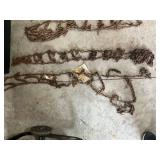 Assorted Tire Chains and Storage Box Collection