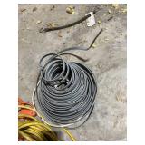 Collection of Outdoor Extension Cords and Electrical Wiring Assortment