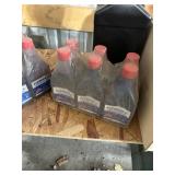 Collection of Outboard Lubricants and Hydraulic Fluids Including Evinrude, Mercury, and More