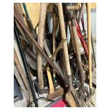 Lot of Assorted Garden Tools Including Shovels, Rakes, and Hoes