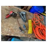 Assortment of Pneumatic Tools and Air Hoses
