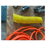 Assortment of Pneumatic Tools and Air Hoses