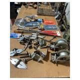 Collection of Garage Door Hardware, Winches, Saw Blades, and Band Saw Blades