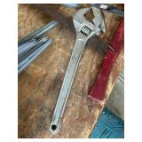 Assorted Hand Tools and Hardware Including Wrench, Saw, Brackets, and Shears
