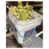 Bucket of Assorted Round Plastic Rod Stock