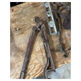 Assorted Vintage Hand Tools Including Levels, Wrenches, and Clamps