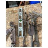 Assorted Vintage Hand Tools Including Levels, Wrenches, and Clamps