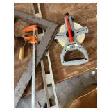 Assorted Vintage Hand Tools Including Levels, Wrenches, and Clamps