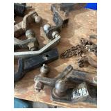 Collection of Trailer Hitches, Ball Mounts, Chains, and Towing Accessories