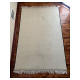Oriental Area Rug with Medallion Pattern and Fringe