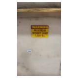 Large Industrial Storage Tank with Valves and Interior Grate