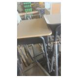 Lot of School Desks with Attached Chairs and Metal Legs