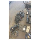 Lot of 8 Two-Way Radios with Chargers, Accessories, and Assorted Bibles