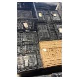 Pallet of Stackable Industrial Plastic Crates and Totes