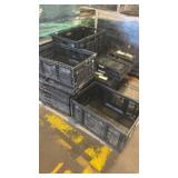 Stack of Black Plastic Crates for Storage or Transport