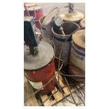 Group of Industrial Grease Barrels with Pump Dispensers