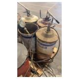 Group of Industrial Grease Barrels with Pump Dispensers