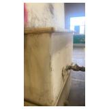 Large Industrial Storage Tank with Valves and Interior Grate