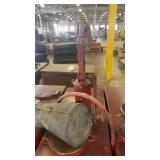 Red Metal Fluid Dispenser with Hand Pump and Funnel