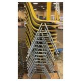 Lot of Stacking Yellow Plastic Chairs with Metal Legs on Rolling Cart