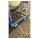Lot of Stacking Yellow Plastic Chairs with Metal Legs on Rolling Cart