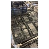 Pallet of Black Plastic Stackable Totes and Crates