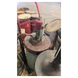 Group of Industrial Grease Barrels with Pump Dispensers
