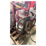 Group of Industrial Grease Barrels with Pump Dispensers