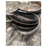 Lot of Paderno Stainless and Cast Iron Fry Pans with Lids