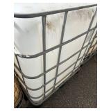 Used 275 Gallon IBC Tote with Metal Cage