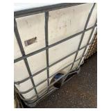 Used 275-Gallon IBC Tote with Metal Cage