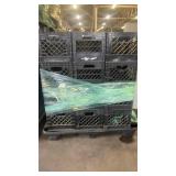 Pallet of plastic milk crates