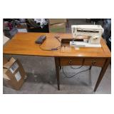 Singer Sewing Machine in Cabinet