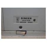 Singer Sewing Machine in Cabinet