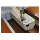 Singer Sewing Machine in Cabinet