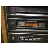 Magnavox Stereo System with Speakers including a turntable, cassette deck, and CD changer