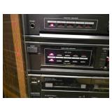 Magnavox Stereo System with Speakers including a turntable, cassette deck, and CD changer