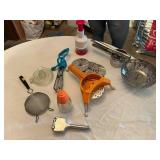 Lot of Kitchen Tools and Gadgets Including Citrus Juicer, Potato Ricer, and Strainer