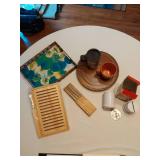 Kitchen Items including Knives, Farberware Meat Tenderizer, Wicker Tray, and Bamboo Bread Slicer