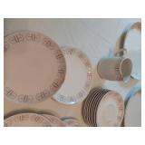Dinnerware Items featuring Plates, Bowls, and Mug