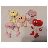 Assorted Figurine Collection including Heart Characters, Animal Figures, and Valentine Decorations