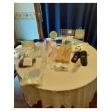 Lot of Household and Personal Care Items including Avon Shower Brush, Slippers, and Mirror