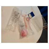 Lot of Household and Personal Care Items including Avon Shower Brush, Slippers, and Mirror