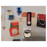 Assorted Jewelry and Accessories including Avon Watch, Pendants, Necklaces, and Compact Mirror