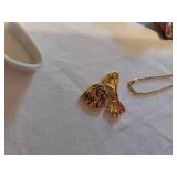 Assorted Jewelry and Accessories including Avon Watch, Pendants, Necklaces, and Compact Mirror